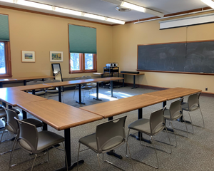 Picture of classroom 1 with tables and chairs